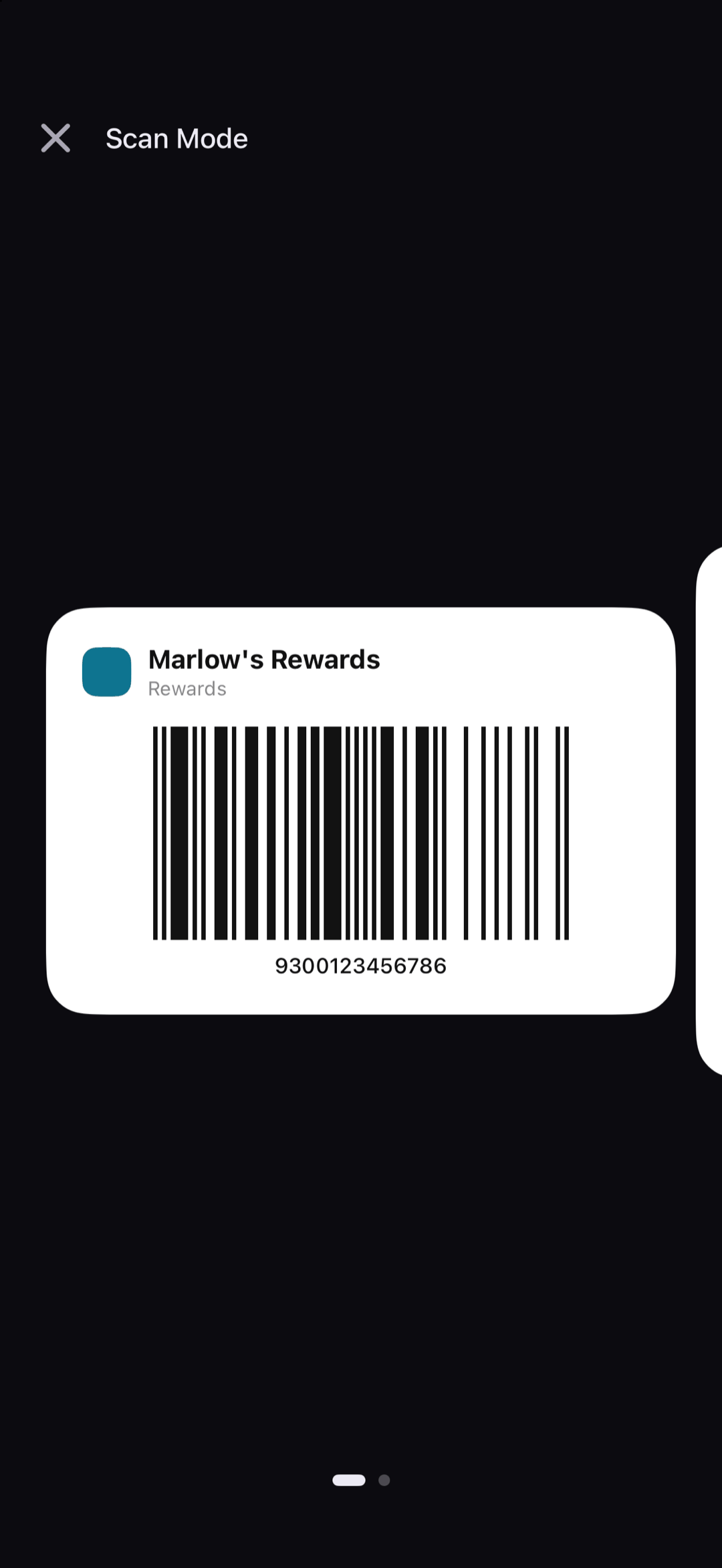 Scan Mode: Marlow's Rewards with its barcode on a white card against a dark screen, the next card peeking in from the right, and page dots below